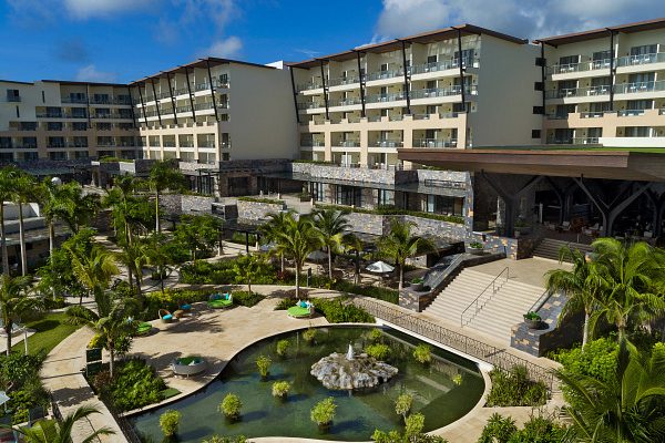 Panoramic view of fish pond, restaurants and lobby stairs